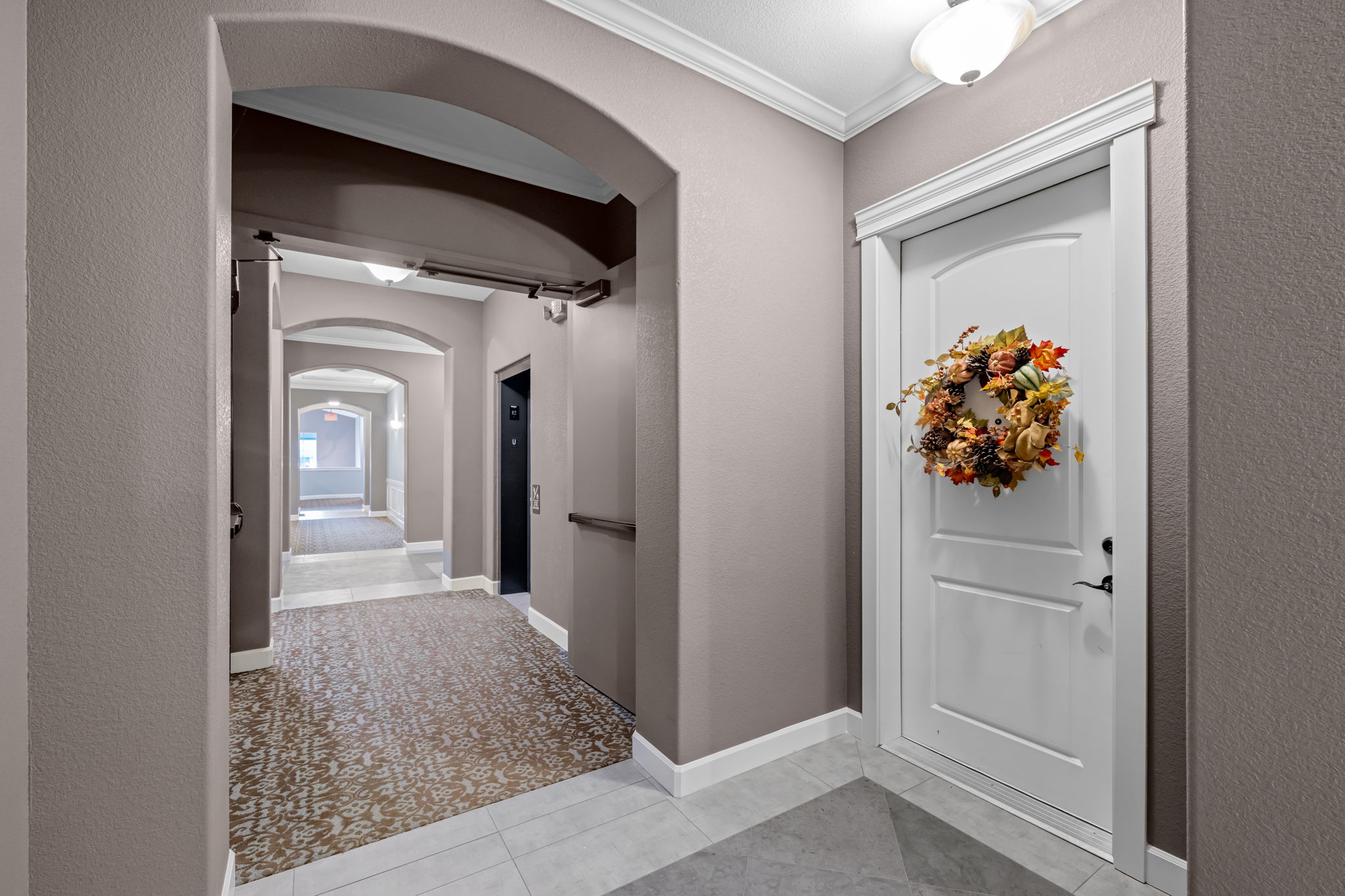 View of unit front door from the hallway