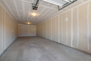 Attached 2 car tandem garage with room for storage
