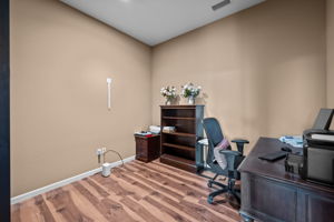 Secondary room for either a guest bedroom (non-conforming) with Murphy Bed or Office