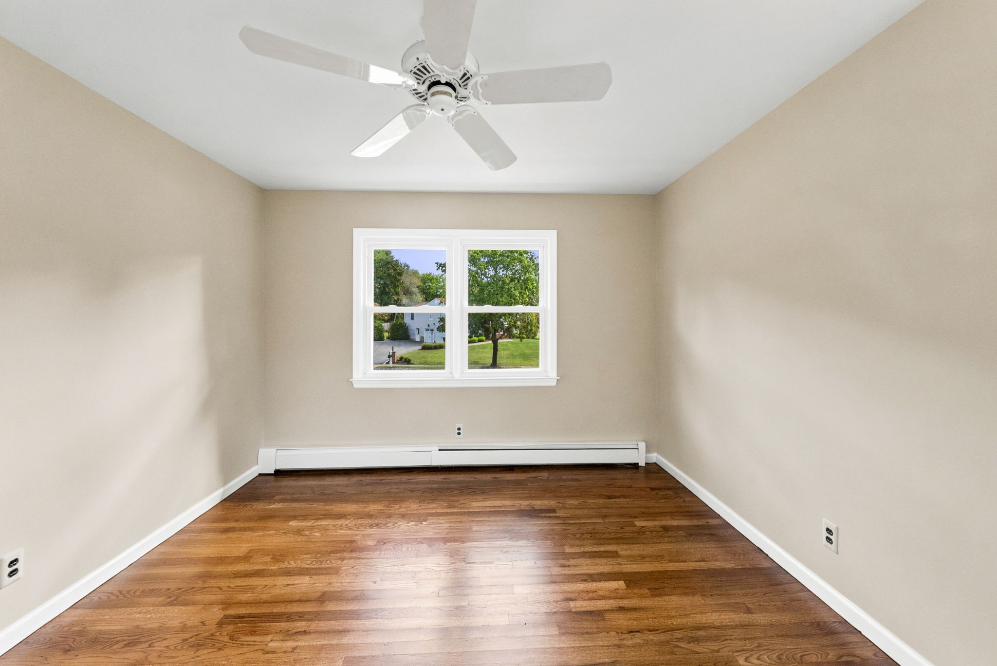 Bedroom #2-freshly painted, refinished hardwood floors +