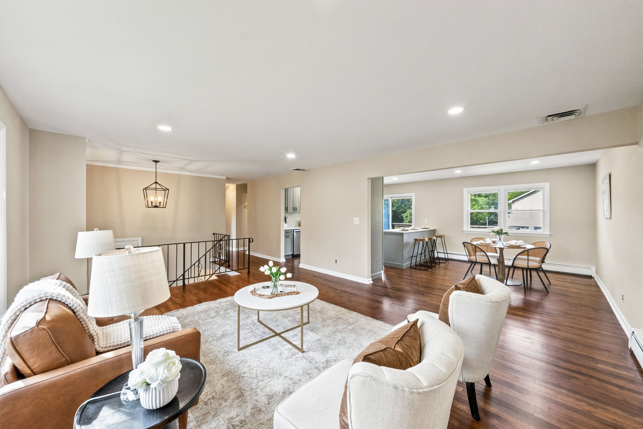 Open concept living; freshly painted, beautiful hardwood floors and open concept living.