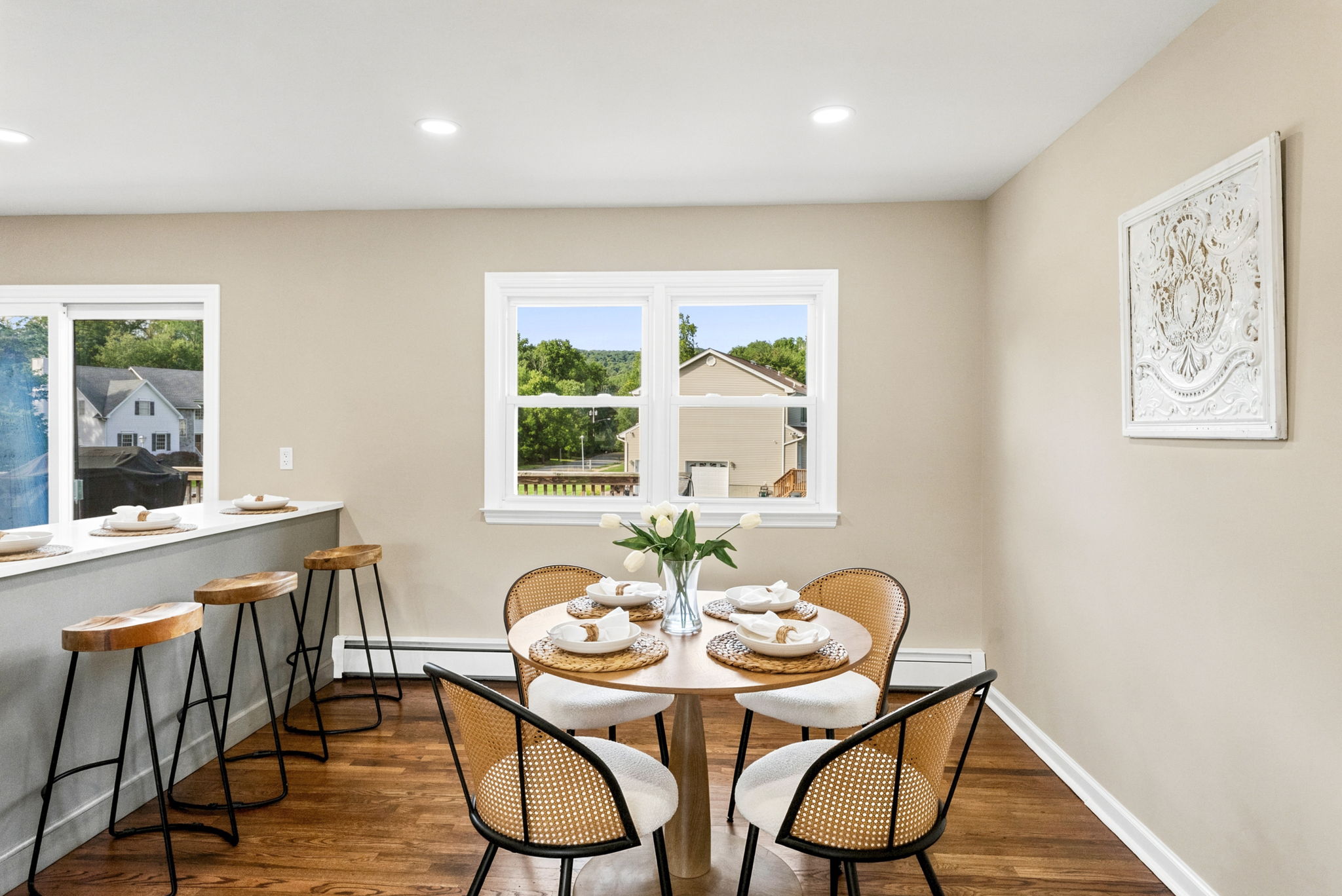 Dining Room; freshly painted, beautiful hardwood floors and open concept living.