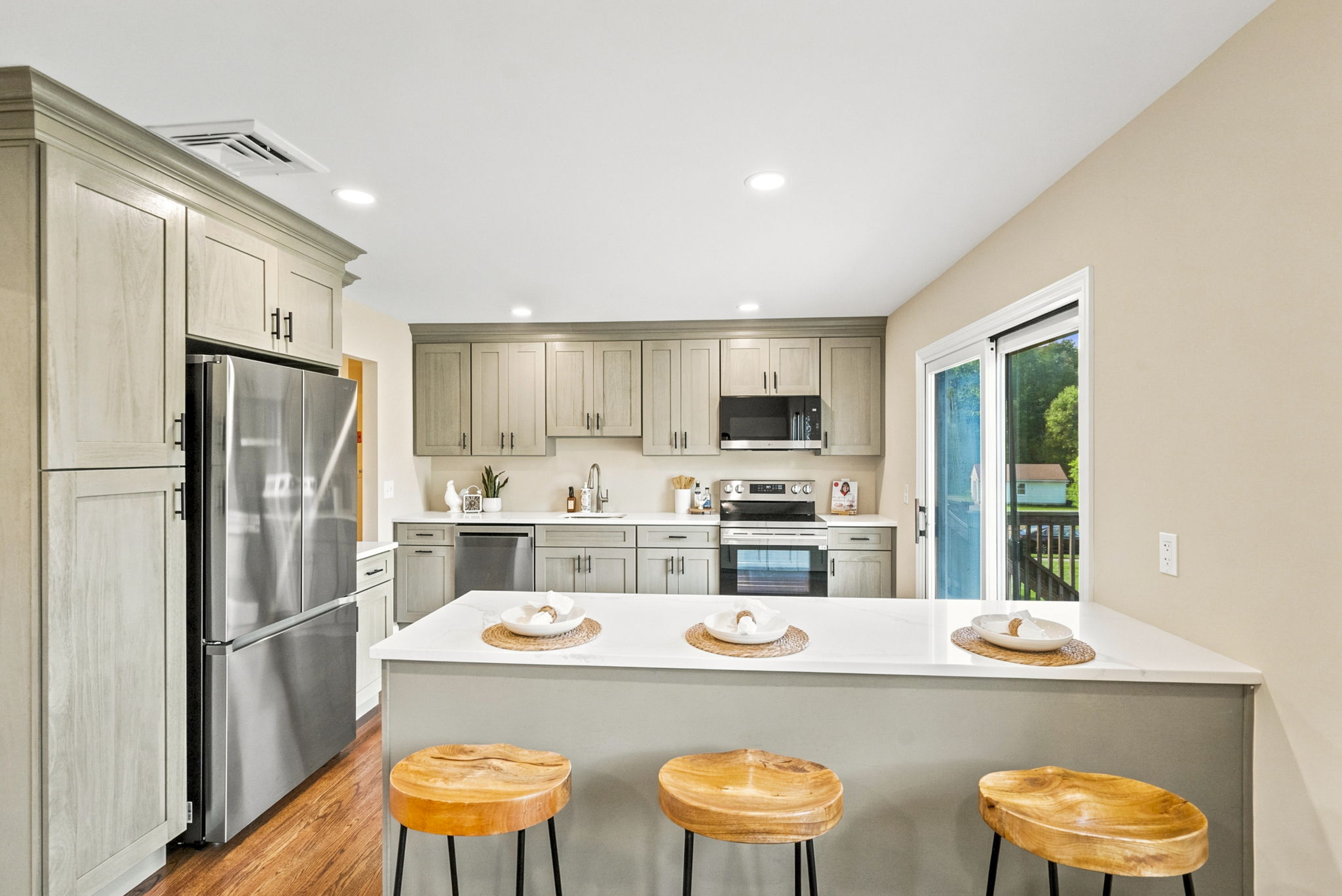 Newly modernized kitchen; beautiful hardwood floors, freshly painted, new cabinets, new ss appliances.