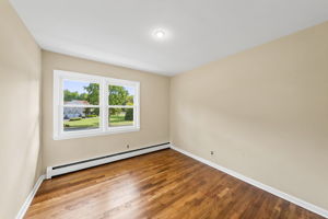 Bedroom #3-freshly painted, refinished hardwood floors +