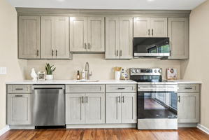 Newly modernized kitchen; beautiful hardwood floors, freshly painted, new cabinets, new ss appliances.