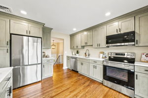Newly modernized kitchen; beautiful hardwood floors, freshly painted, new cabinets, new ss appliances.