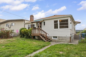 1948 Downtown Renton fixer on a 10,018 SqFt street-to-alley lot.