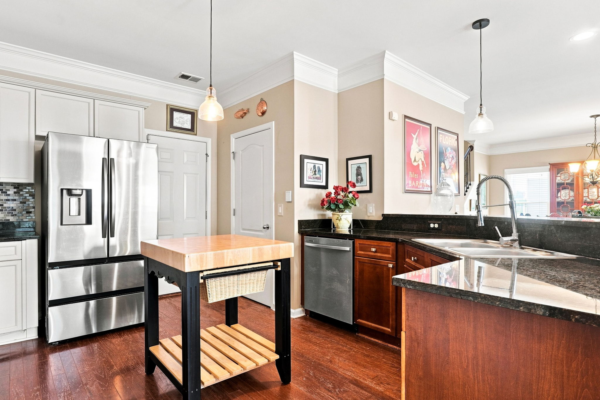 Pantry is spacious and the door is next to the dishwasher and the garage door is next to the refrigerator