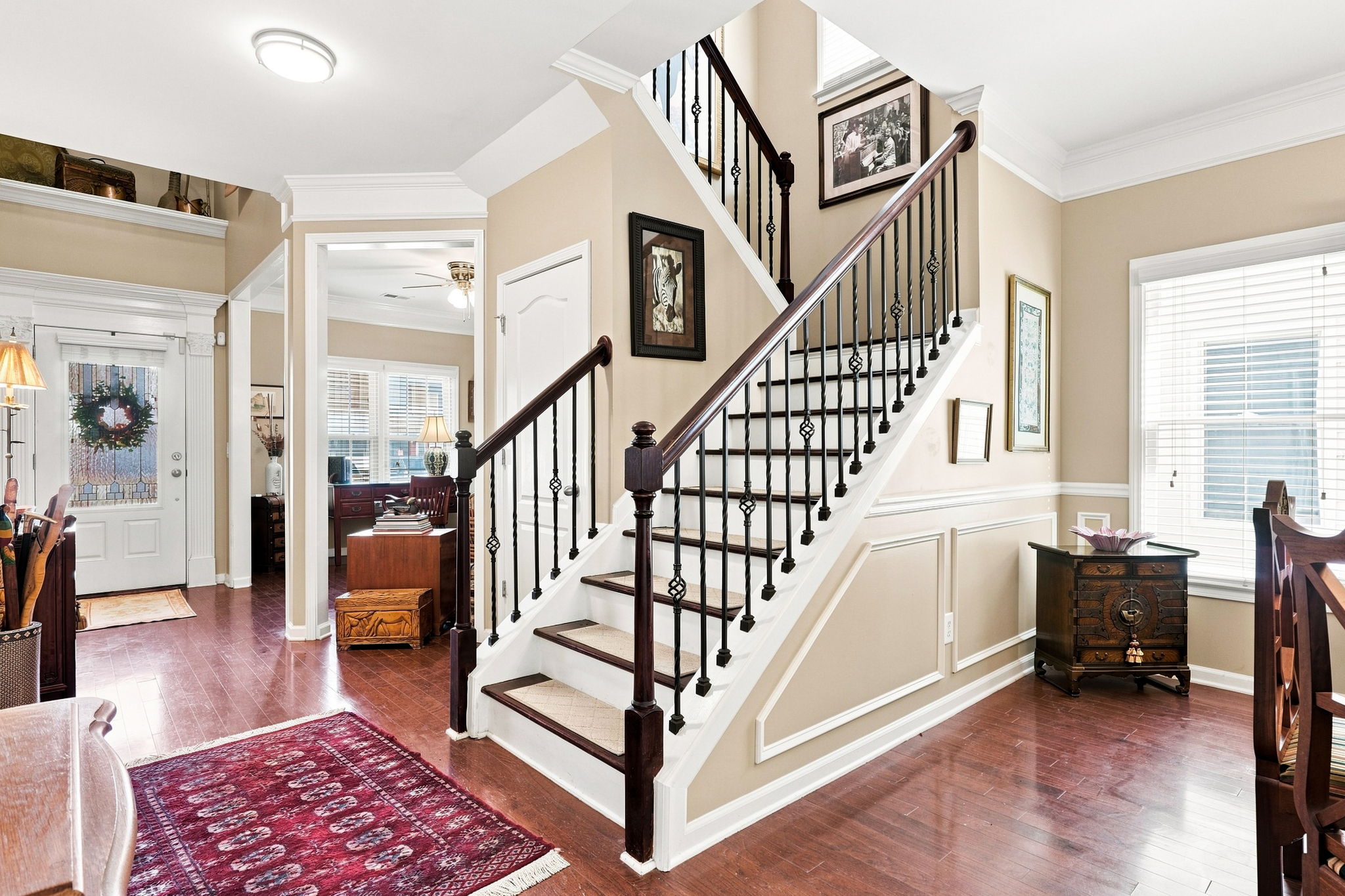 Iron Balusters provide beauty to the stairs going to Bedroom Area