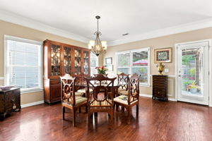 Large Dining Room-the door opens to covered patio and outside dining with a fenced yard