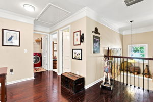 View of  upstairs landing overlooking. Gorgeous hardwood