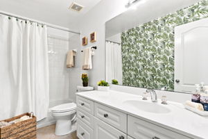 Full Bath conveniently located in the hall between the Second (currently a closet) and Third Bedroom