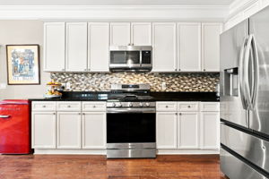 View of cabinets and range when island is removed...GREAT SPACE