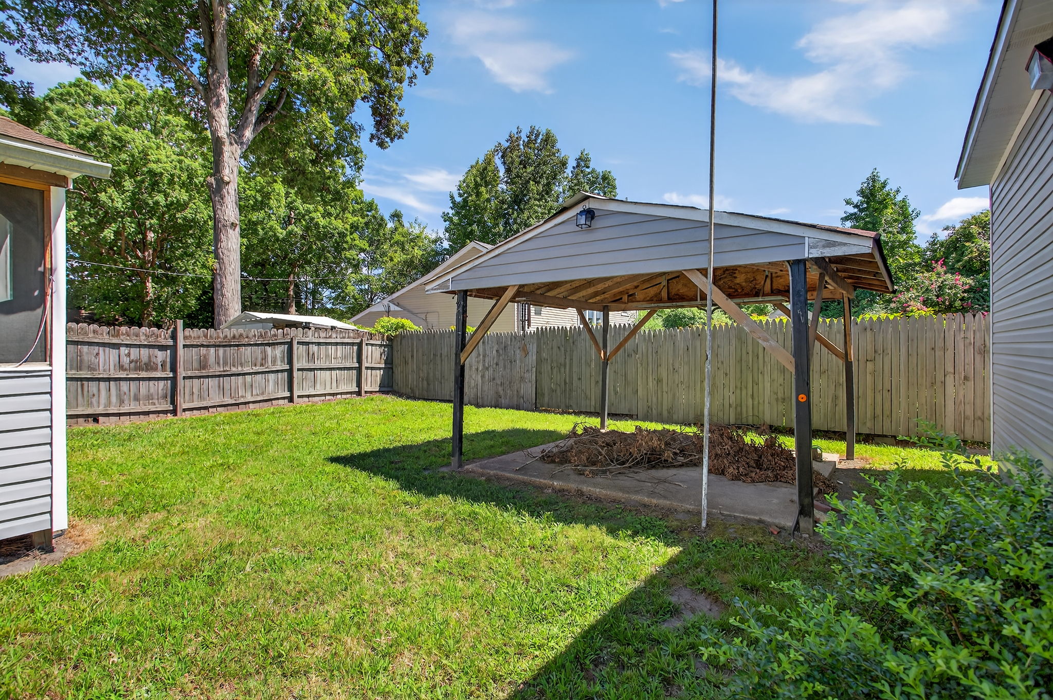 Gazebo and patio offer space to relax or entertain.