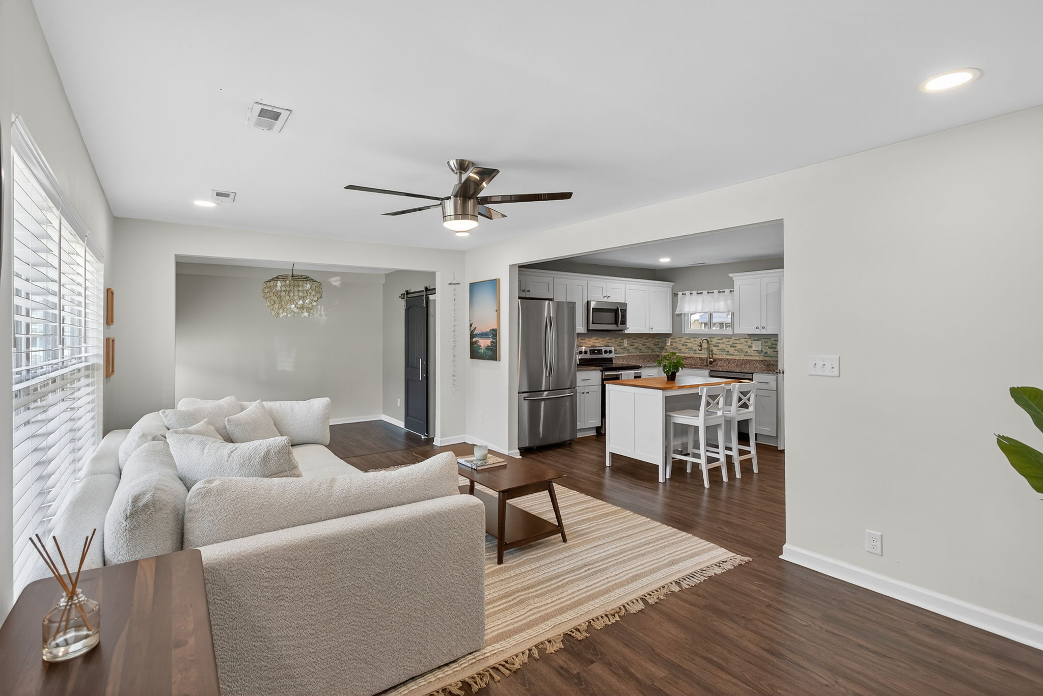 Fresh flooring and natural light throughout.