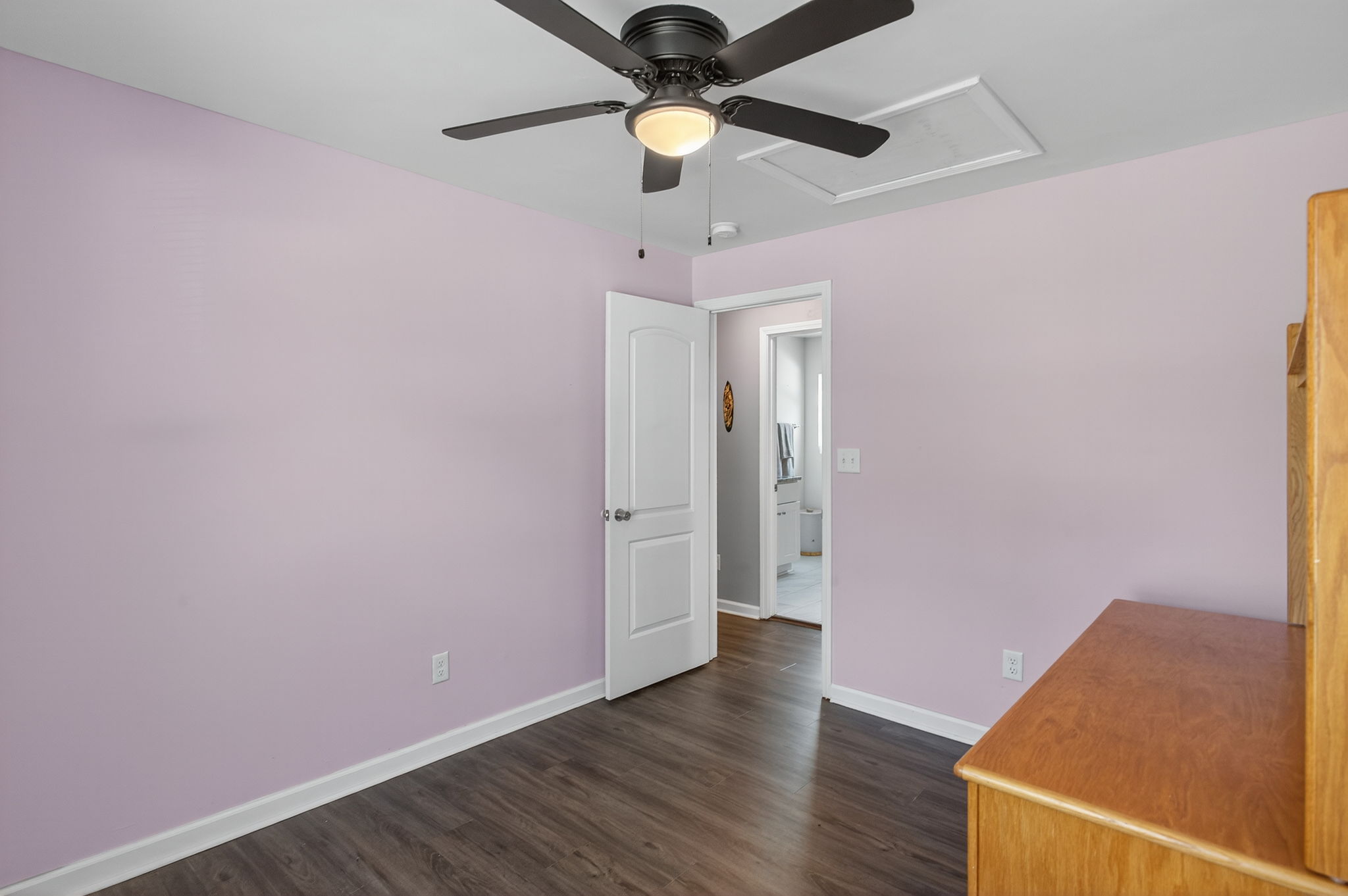 Comfortable and neutral bedrooms.