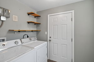Easy-access utility area off main living spaces.