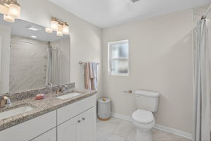 Updated hall bath with dual vanity.