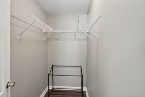Spacious walk-in closet with ample storage.