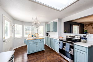 Spacious kitchen with plenty of countertop space and cabinets