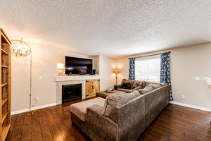 Family room with a fireplace to keep you warm on a chilly Colorado night!