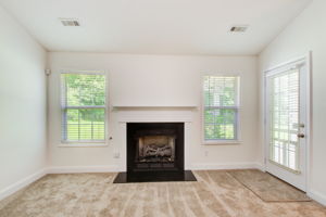 6 Living Room B Fireplace Detail w Patio Walkout