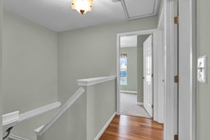 Upper level hallway with hardwood floors!