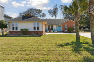 Welcome Home to Island Living at 2210 Atlantic Avenue where the palm trees sing and the surf is  a short walk down the street