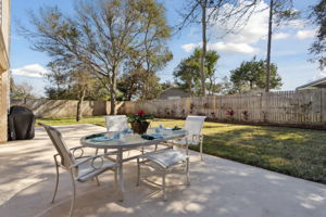 Large Patio perfect for al fresco dining , Oak tree and Bradford Pear tree