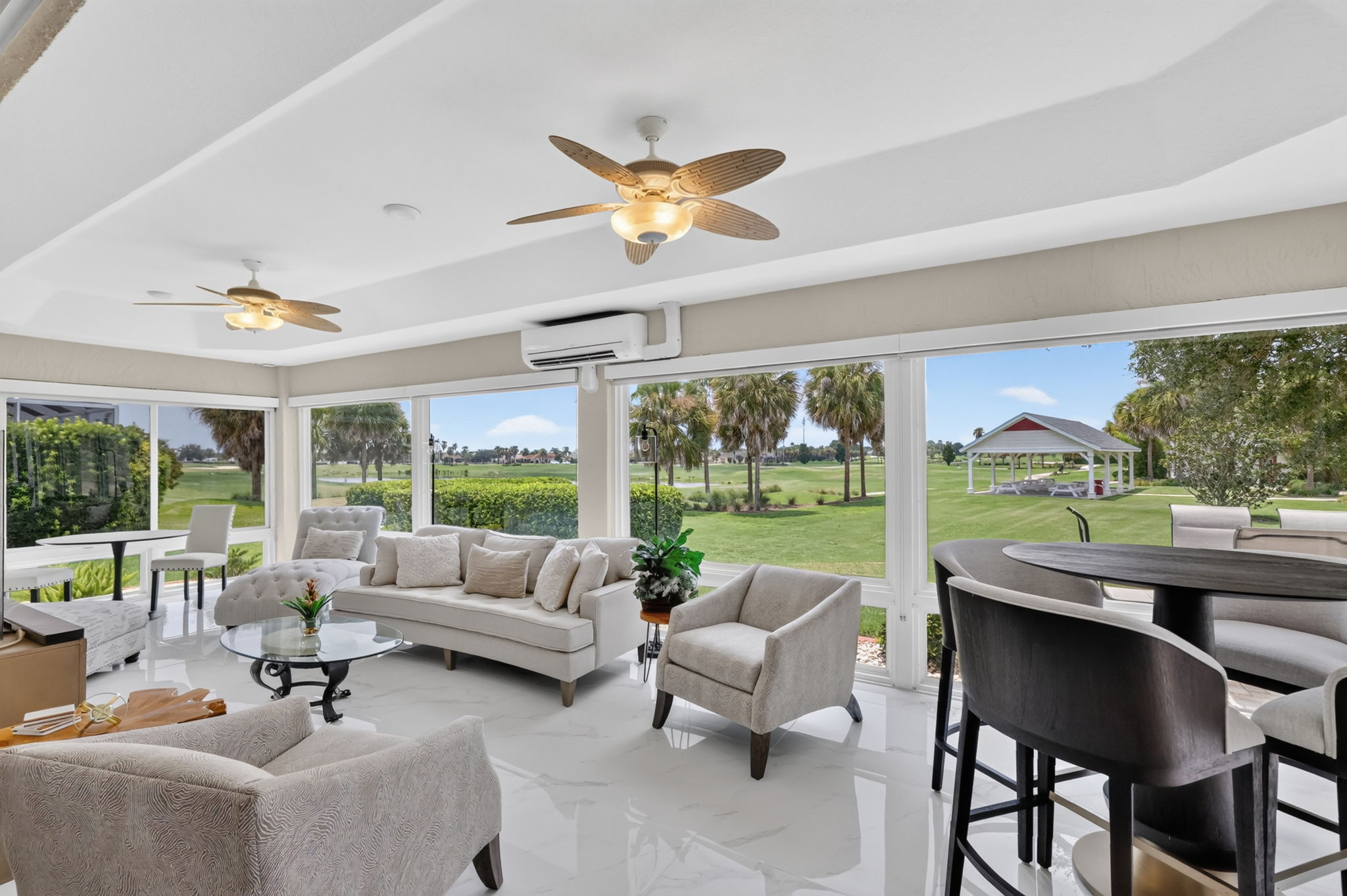 Expansive 384sf Florida Room with Golf and Water Views!