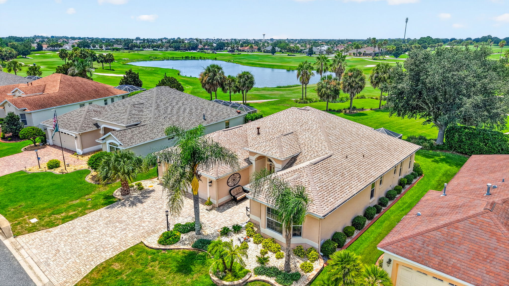 Aerial Front and Side Elevation with Golf and Water Views