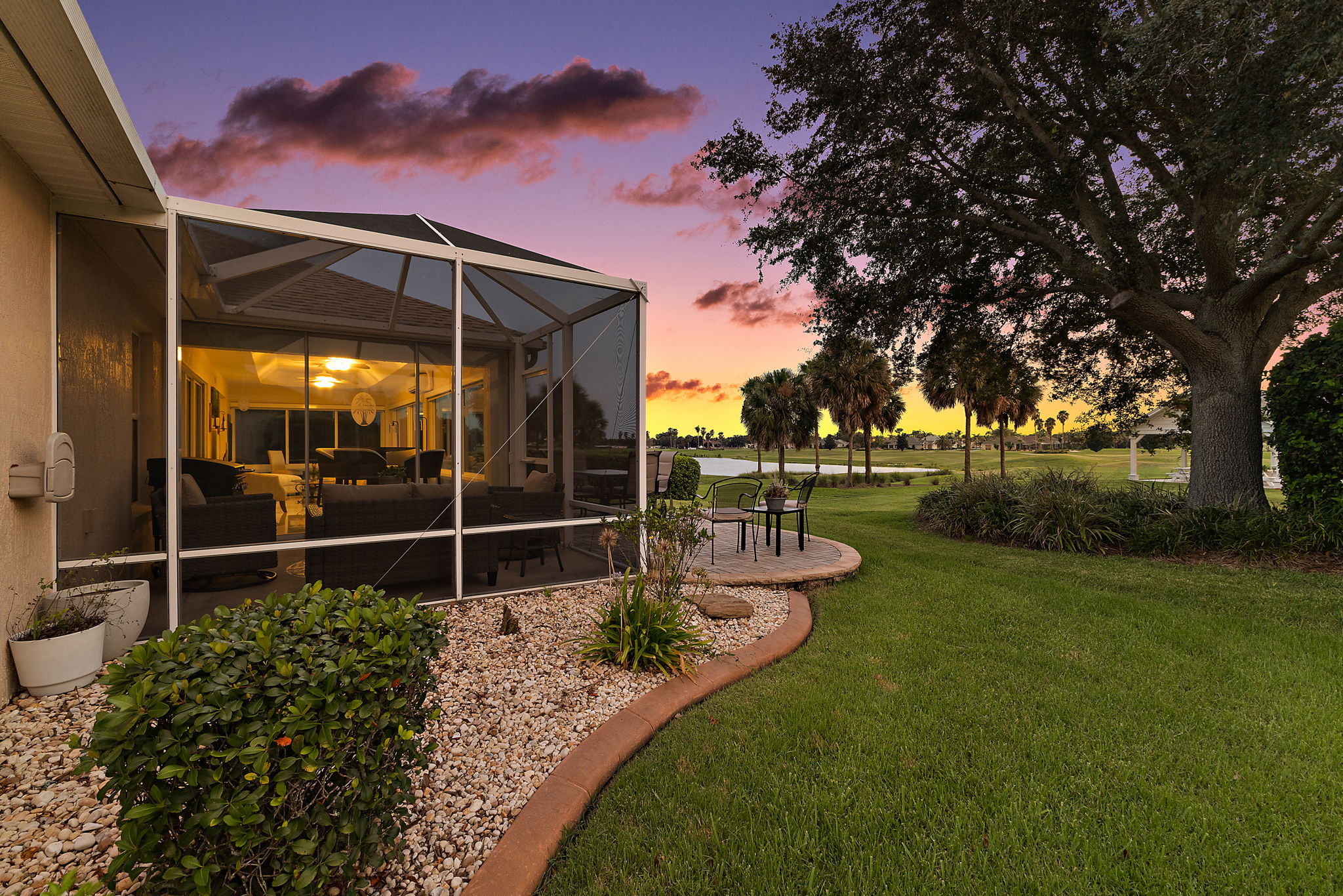 Twilight Side Elevation with Golf and Water Views!