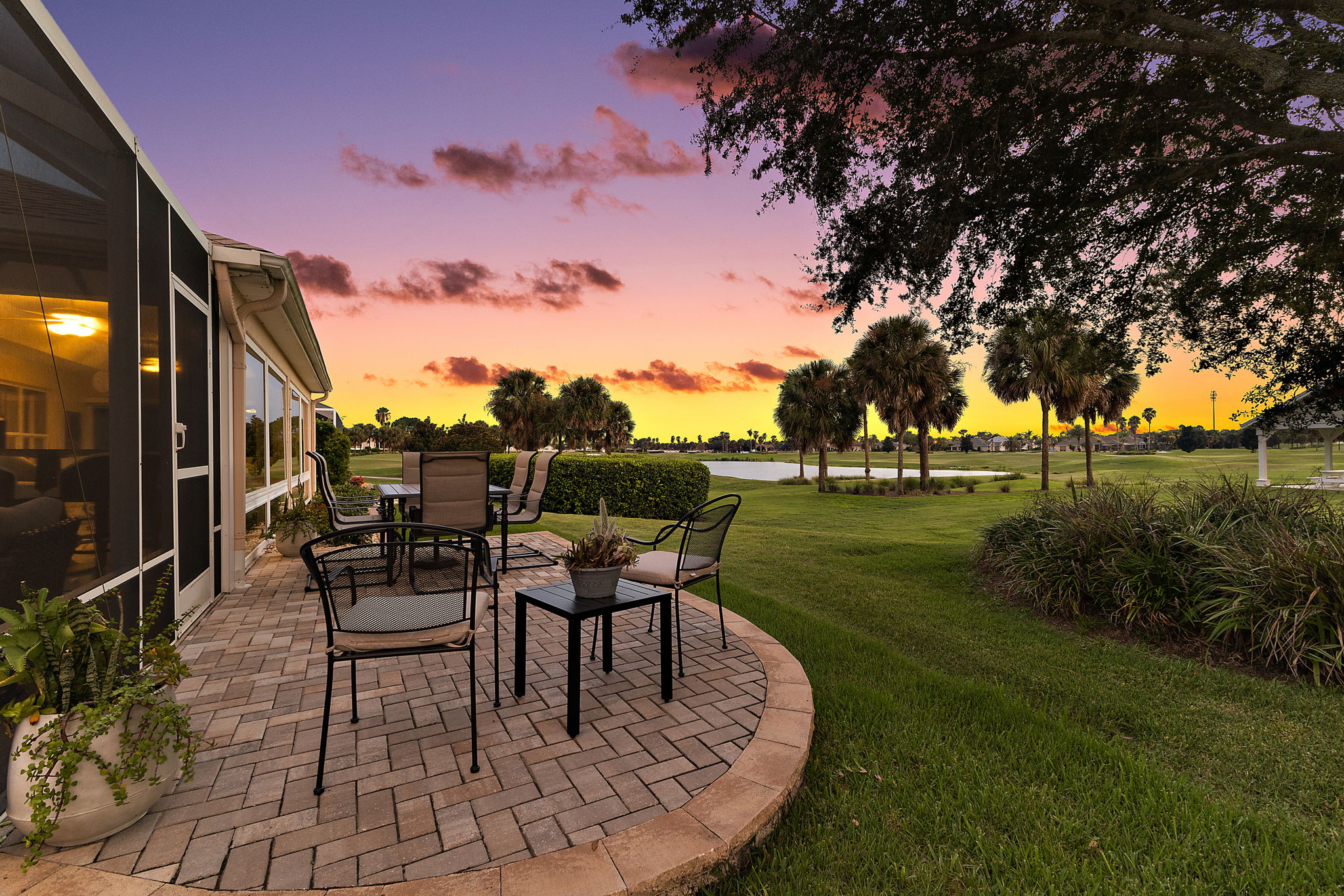 Rear Paver Patio with Twilight Golf and Water Views!