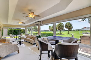 Expansive 384sf Florida Room with Golf and Water Views!