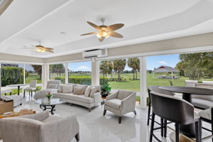 Expansive 384sf Florida Room with Golf and Water Views!