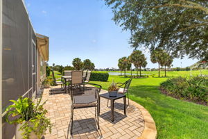 Rear Paver Patio with Golf and Water Views!