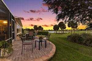 Rear Paver Patio with Twilight Golf and Water Views!