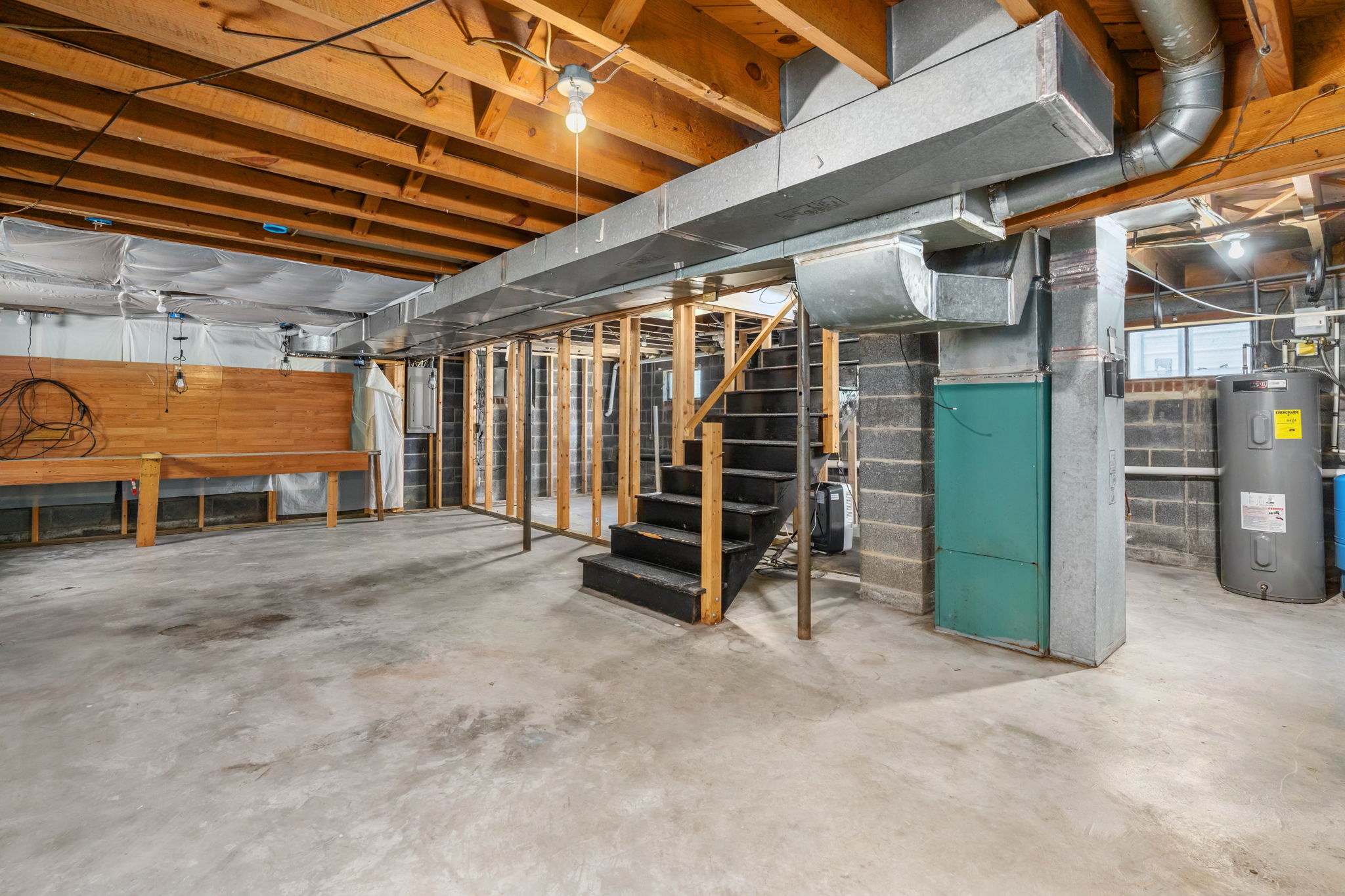Basement offers tons of potential and storage!