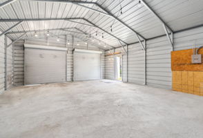 Deep garage has room for potentially up to 4 cars!