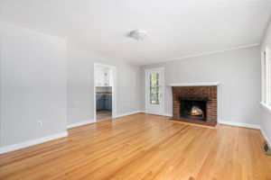 Brick wood burning fireplace with mantel!