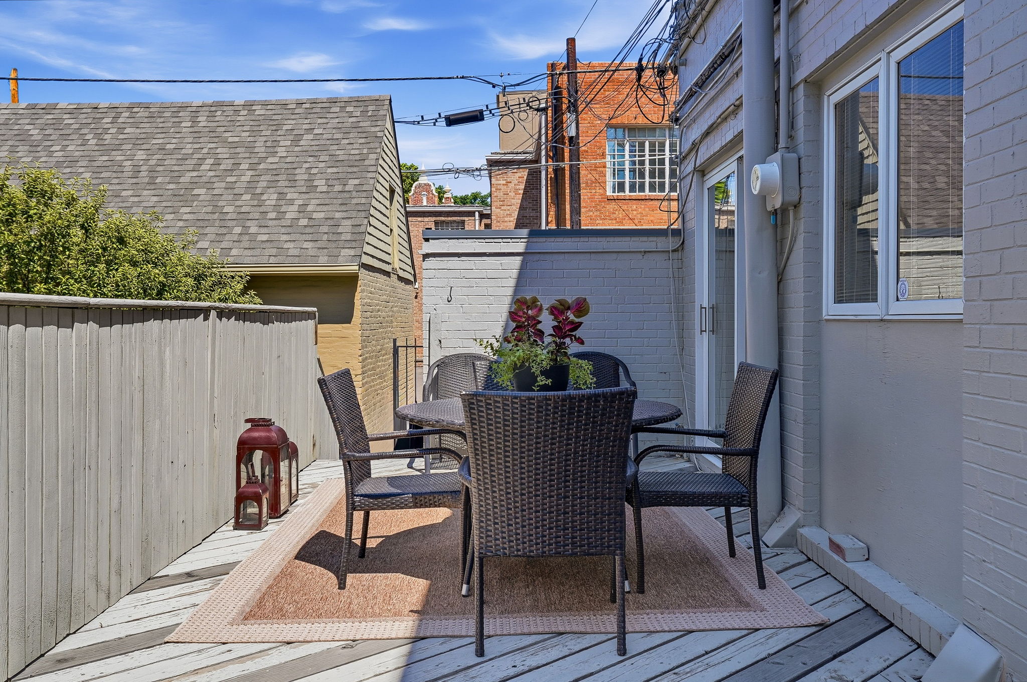 Back patio with faucet for your green thumb