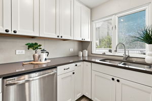 Updated kitchen with stainless appliances and large under-mount sink