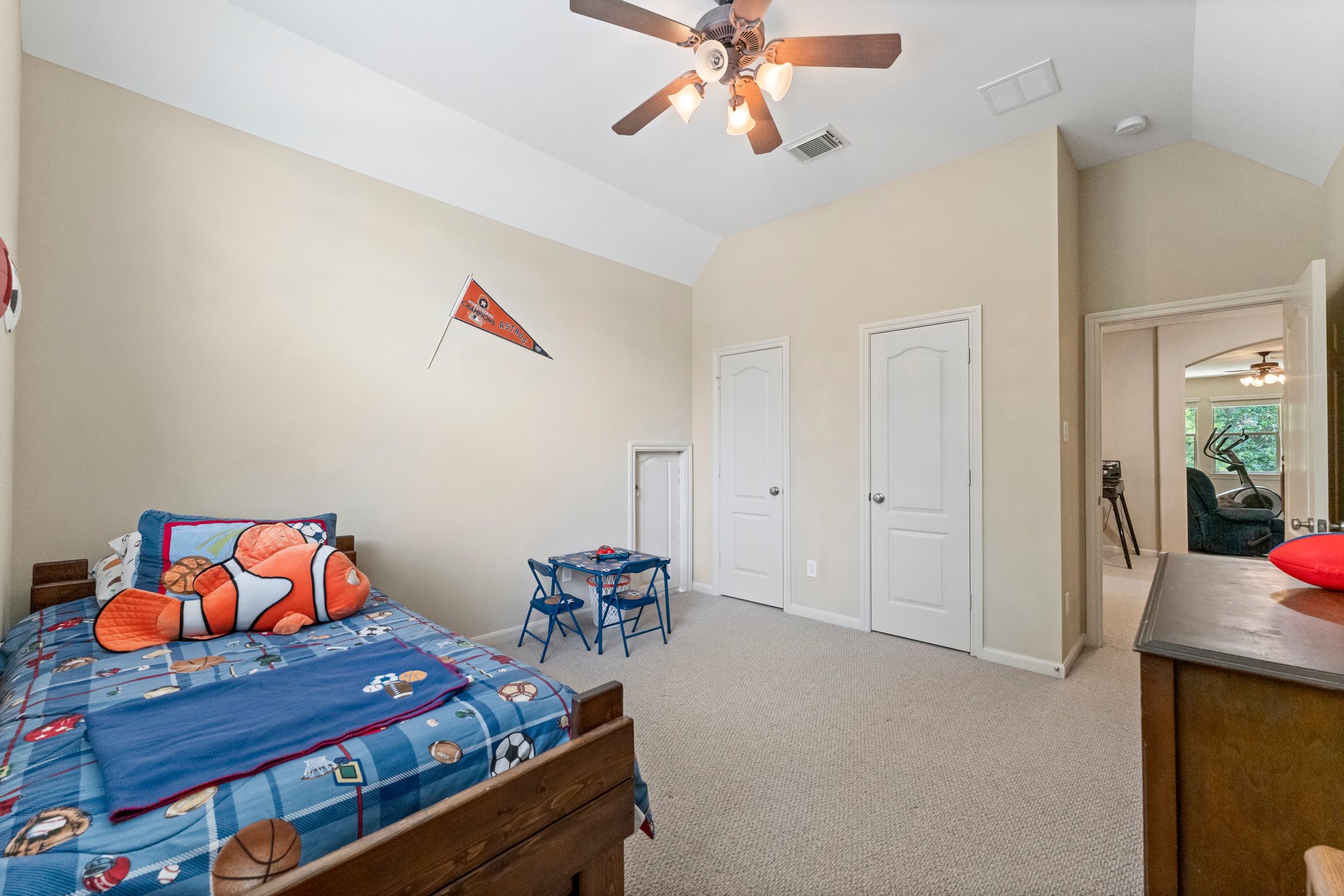View of secondary bedroom shows 2 large closets.