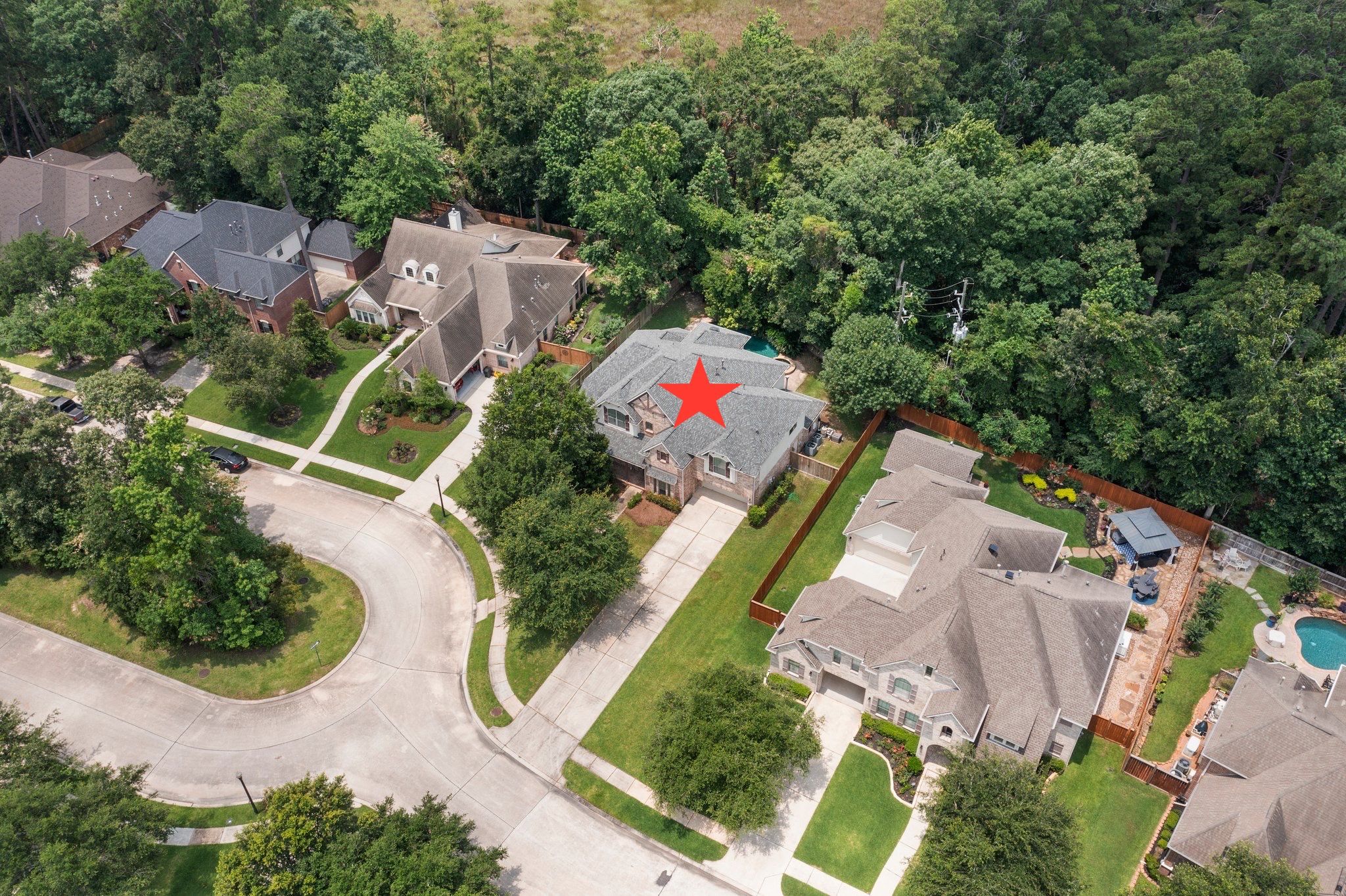 Aerial view showing location of home in culdesac.