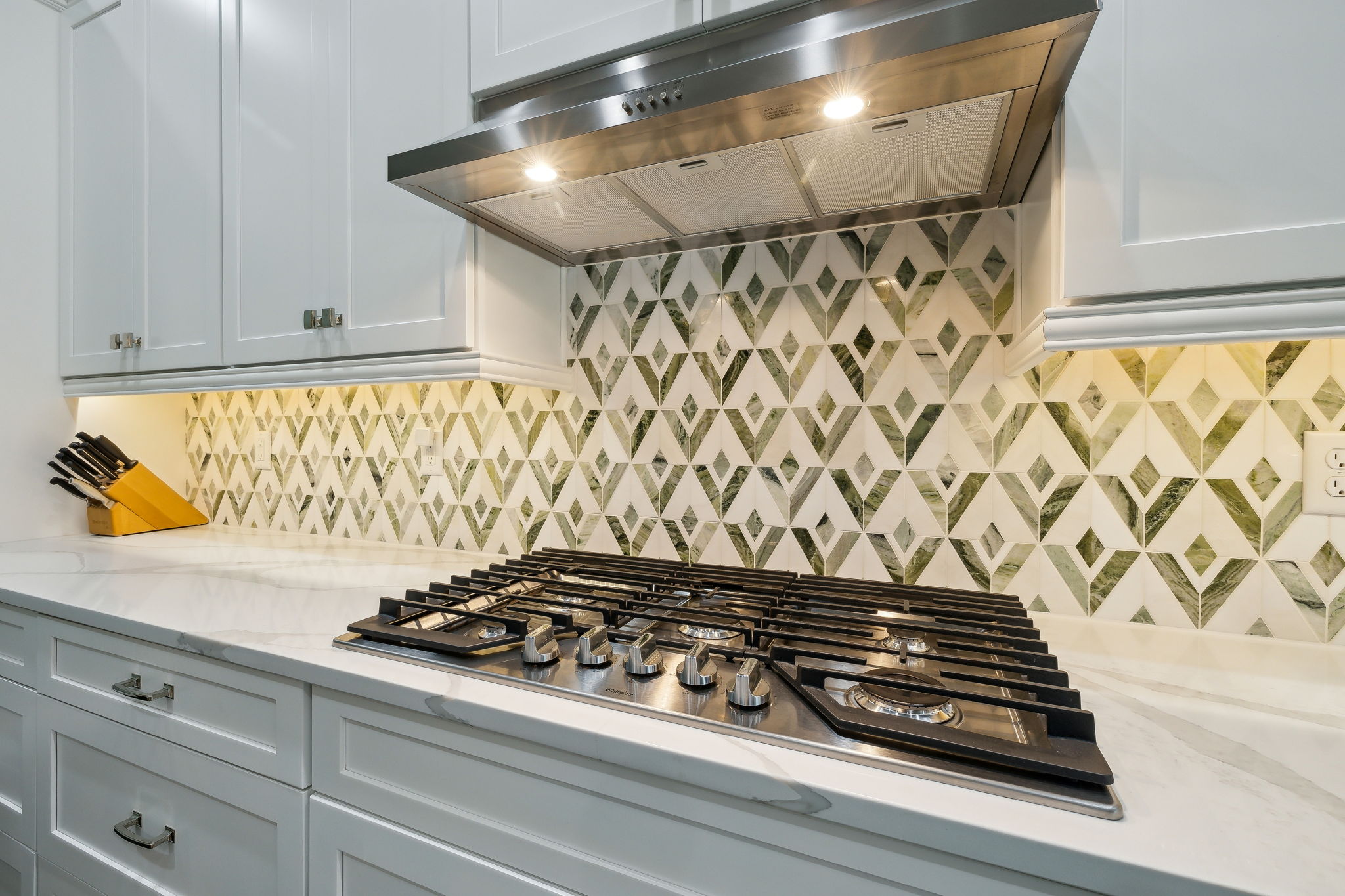 Gas Cooktop & Marble Backsplash