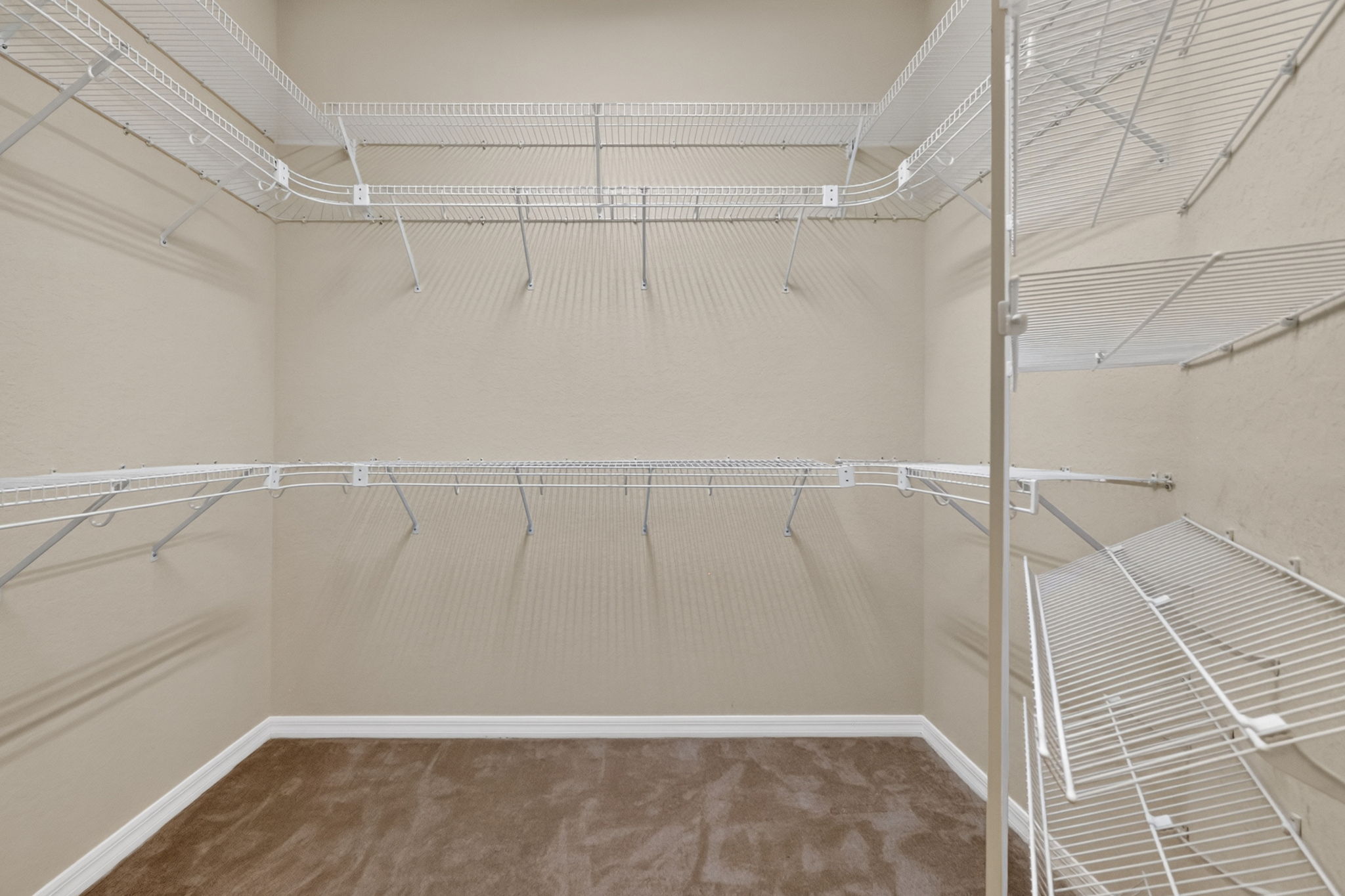 Primary Bedroom First Walk-In Closet