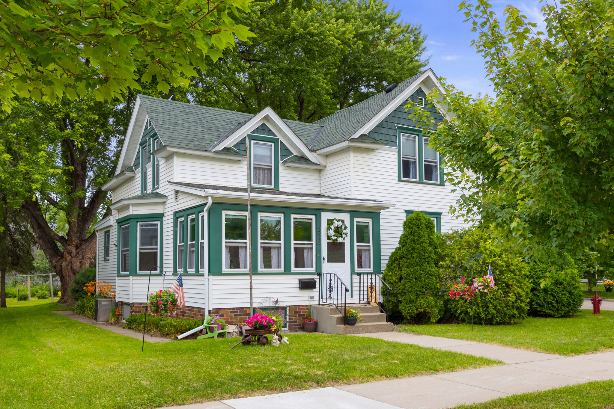 This charming period home with brick accents, multiple gables, and front porch exudes warmth and character. The updated roof, steel siding, gutters, and decorative vinyl shakes offer a lowmaintenance lifestyle without sacrificing classic beauty.