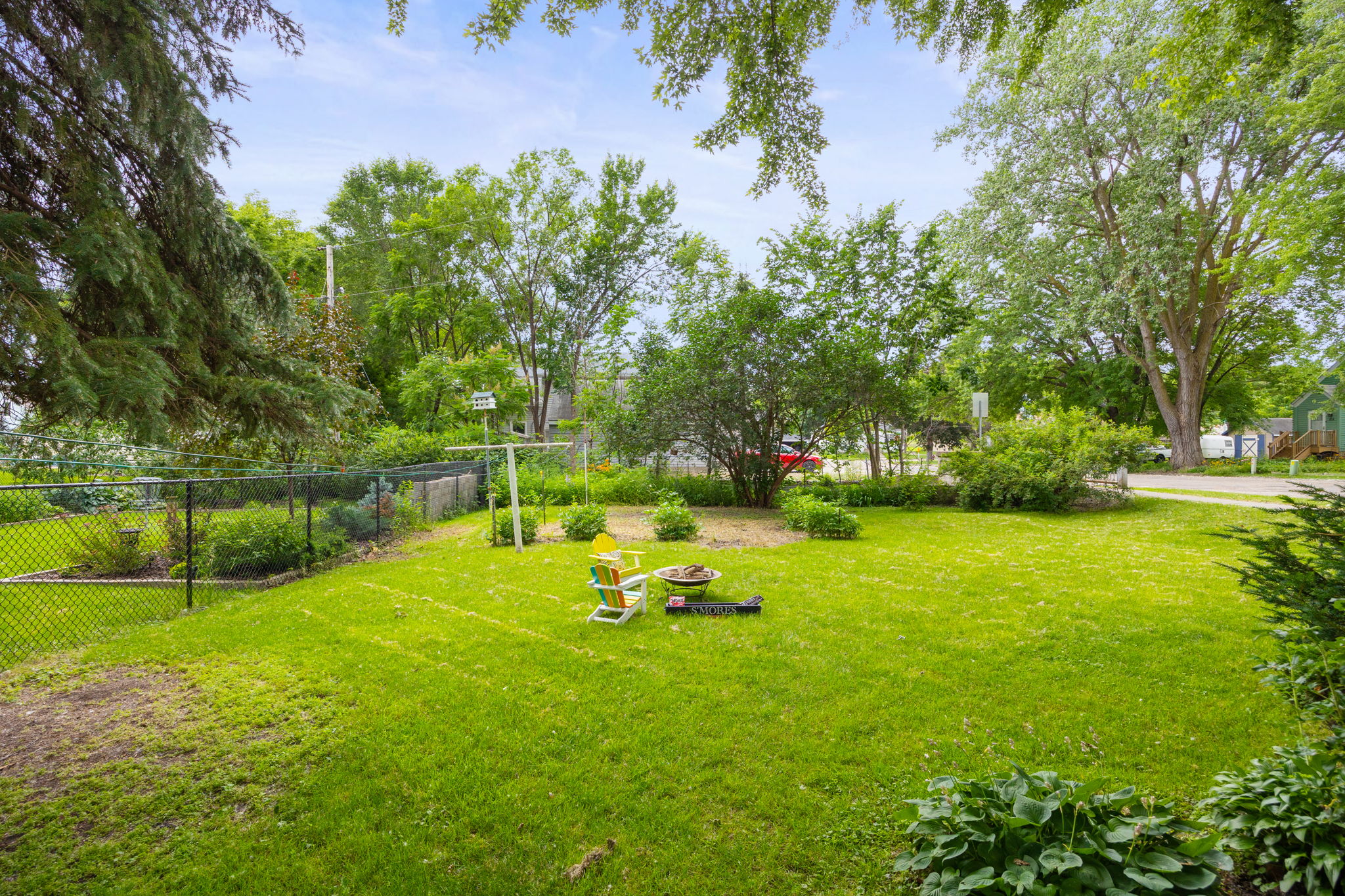 Huge backyard with room for a fire pit, garden plot and much, much more! The 150' deep lot provides tons of space and plenty of options.