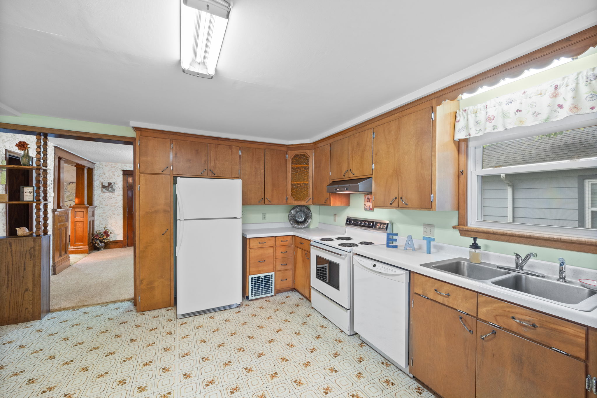 An addition off the back of the home allows room for a spacious eat-in-kitchen with plenty of storage!