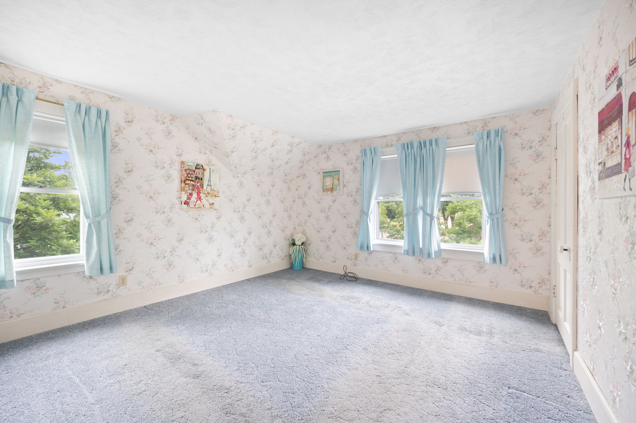 The bedrooms in the upper level also feature lots of windows to let in light and fresh air. This room is 13' x 11' and offer great closet space.